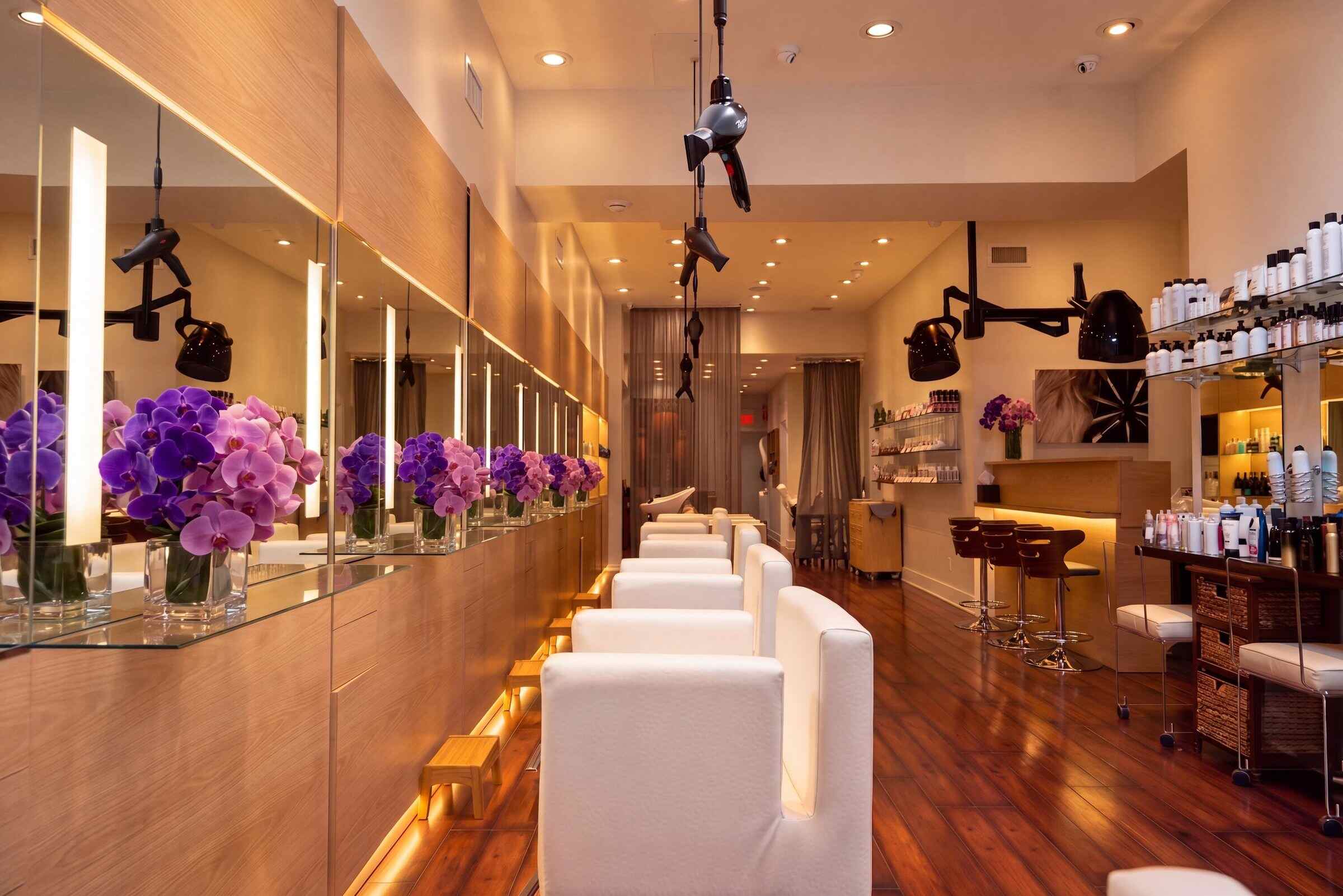 Styling chairs inside 27 Hampton Salon, a hair salon and day spa in Southampton, NY